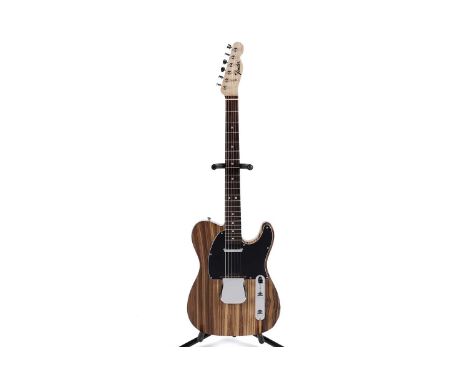 A Fender Japan Custom Zebrano Telecaster, serial number JD 12xxxx75, with lacquered rosewood fretboard and maple neck, in vin