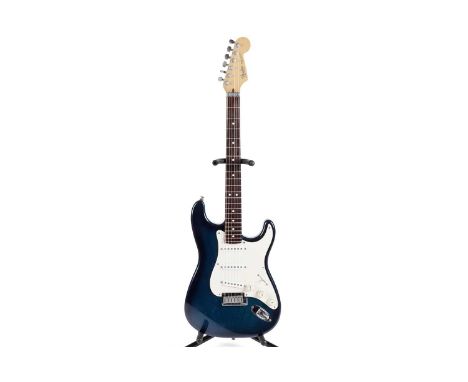 A Fender USA Strat Plus, serial number E9xxxx3, circa 1989, with locking tuners and nut, dark blue sparkle burst finish, Fend
