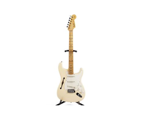 A Fender USA Eric Johnson Signature Thinline Stratocaster, serial number EJ19xx1, with maple neck, cream/blond finish, single