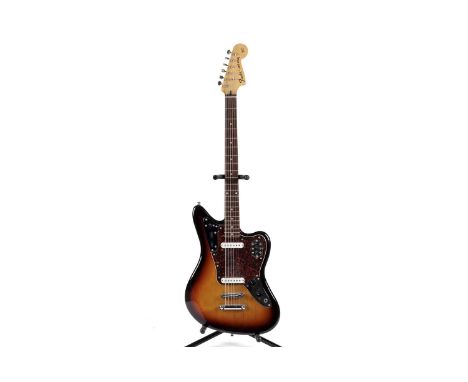 A Fender Japan Baritone Jaguar, serial number Q 08xxx1, with stop tailpiece and Tune-o-Matic bridge, three tone sunburst fini