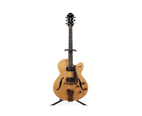 A Fender D'Aquisto designed hollow-bodied jazz guitar, serial number B 01xxx6, with natural maple laminate construction, thre