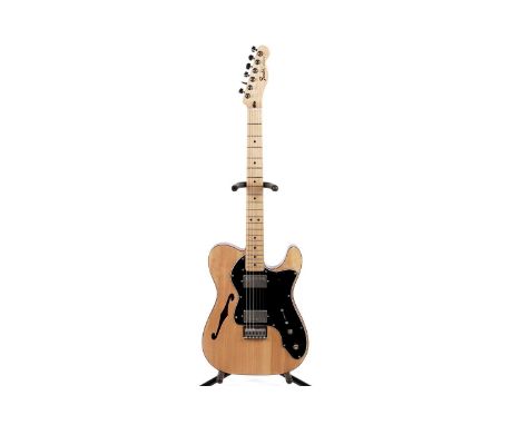 A T-style Thinline guitar with Fender Mexico neck, tortoiseshell bound chambered body with pine top, fitted with two humbucke