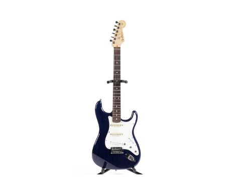 A Fender USA Custom Shop Stratocaster, serial number CZxxx95, with figured maple neck, rosewood fretboard and trans-blue ash 