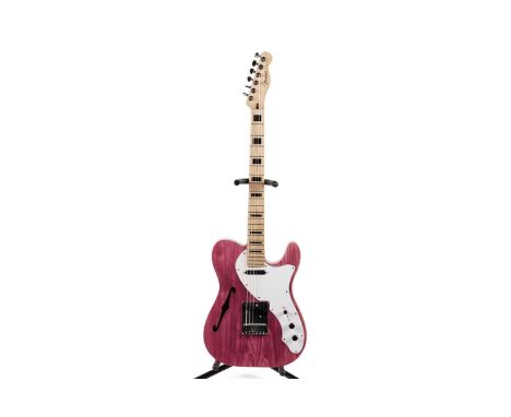 A T-style Thinline guitar with block inlaid Fender Mexico neck, Lace Sensor bridge pickup, pink finish in moulded Gator case.