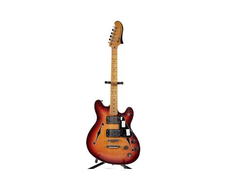 A Fender Starcaster Reissue, made in China, with maple neck, cherry sunburst finish, fitted with two humbuckers, Fender soft 