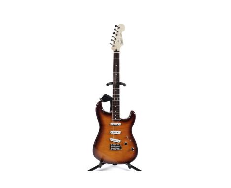 A Fender Mexico Special Edition Stratocaster, with flame burst body, maple rosewood neck, locking tuners, Fender soft bag.