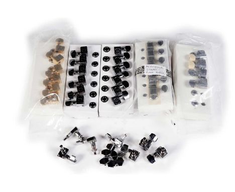 Four sets of Fender tuners, comprising: a set of Fender gold finish tuners; a set of Fender vintage style tuners; two sets of