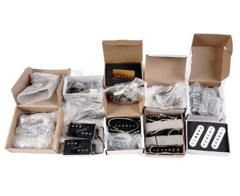 A quantity of guitar pickups, including: a pair of Fender chrome humbuckers; a Fralin Pure PAF set; a Klein Epic Strat set; a