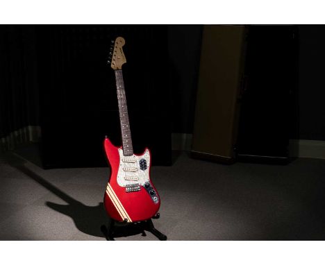 A Fender Mexico Cyclone guitar, serial number MZ40xxx14, with maple neck and rosewood fretboard, three single coils, in tweed