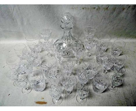 Stuart Glengarry: a suite of cut glass crystal ship's style decanter and thirty glasses, including six each of wine, liqueur,