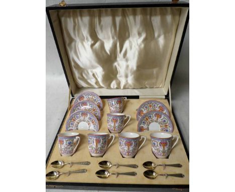 A Royal Worcester Bone China Coffee Service in a fitted black &amp; gilt tooled case with ivory silk interior, date code 1933