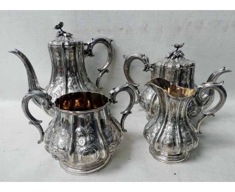 A mid-19th century silver four-piece Tea Service, by Elkington and Co, pear form, embossed panels of flower blooms, teapot an