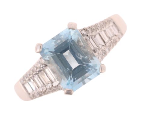 An Aquamarine and Diamond Ring, set with an octagonal step cut aquamarine of approximately 2.15 carats, the tapered shoulders