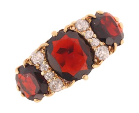 An Antique 18ct gold garnet and diamond half hoop ring, set with oval mixed-cut garnets and old-cut diamonds, setting height 