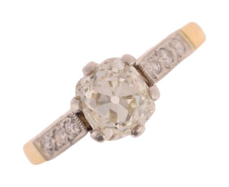 An 18ct gold 1ct single stone diamond ring, claw set with old mine-cut diamond flanked by modern round brilliant-cut diamond 