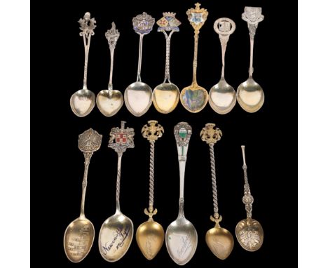 Group of English and Continental silver souvenir spoons, including Davos landscape enamel example, 5.3oz gross . Condition Re