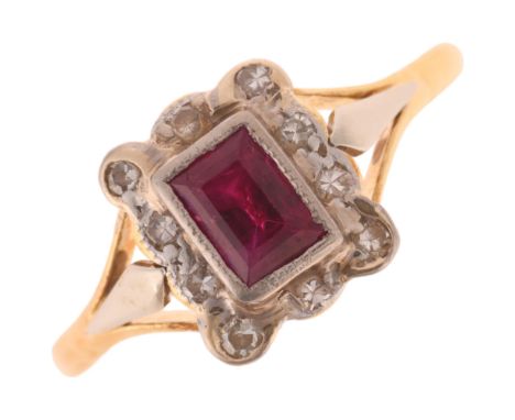 An 18ct gold ruby and diamond cluster ring, set with rectangular step-cut ruby and single-cut diamonds, unmarked mount tests 