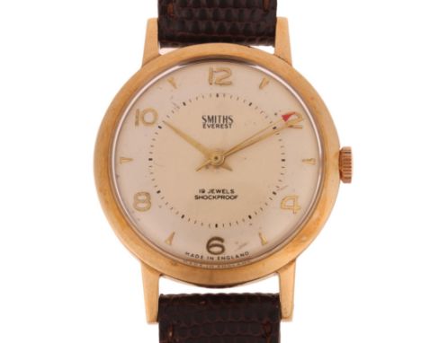 SMITHS - a Vintage 9ct gold Everest mechanical wristwatch, circa 1960s, silvered dial with applied gilt eighthly Arabic numer