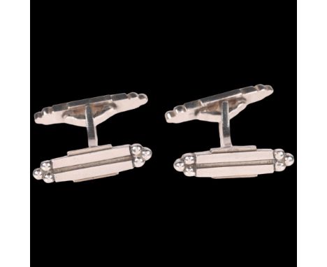 GEORG JENSEN - a pair of Art Deco style Danish modernist sterling silver cufflinks, designed by Poul Hansen, model no. 57B, 1