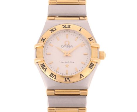 OMEGA - a lady's stainless steel and gold Constellation quartz bracelet watch, ref. 795.1203, circa 1995, silvered textured d