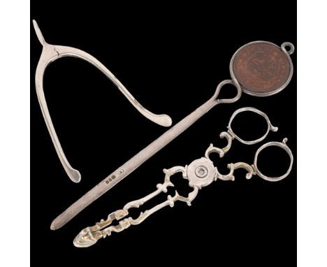 Various silver, including wishbone sugar tongs, South African penny letter opener, etc . Condition Report:Lot sold as seen un