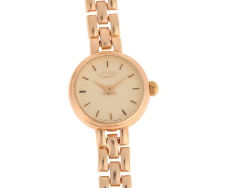 ROTARY - a lady's 9ct gold quartz bracelet watch, champagne dial with baton hour markers, lance hands and 9ct gatelink bracel