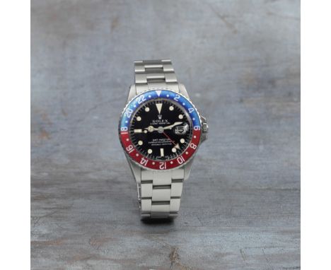 Rolex. A stainless steel automatic calendar bracelet watch with dual time zoneModel: GMT-Master 'Pepsi'Reference: 1675Date: C