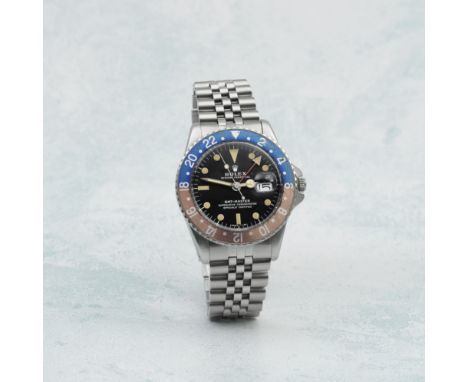 Rolex. A stainless steel manual wind calendar bracelet watch with dual time and pointed crown guardsModel: GMT Master 'Pepsi'