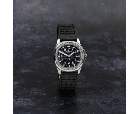 Patek Philippe. A fine stainless steel and diamond set quartz calendar wristwatchModel: AquanautReference: 5067Date: Circa 20