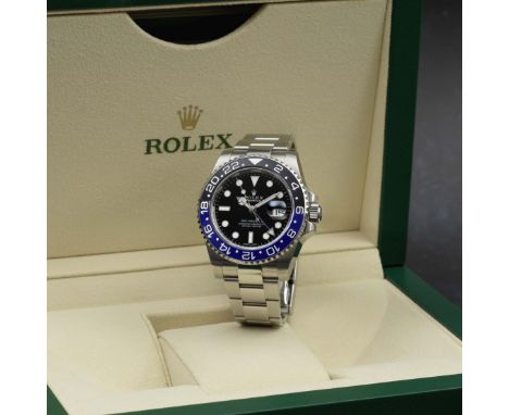Rolex. A stainless steel automatic calendar bracelet watch with dual time zoneModel: GMT-Master II 'Batman'Reference: 116710B