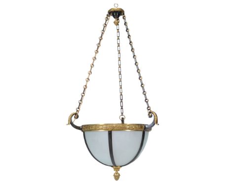  A French wrought iron, brass and glazed three light electrolier,   circa 1900, of dished form, with six opaque glass segment