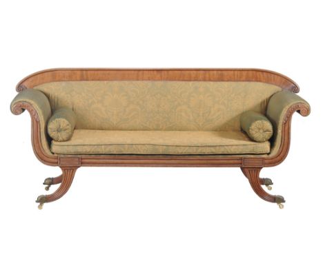  A George IV mahogany and upholstered scroll end sofa  , circa 1825, 91cm high, 210cm long 65cm deep 