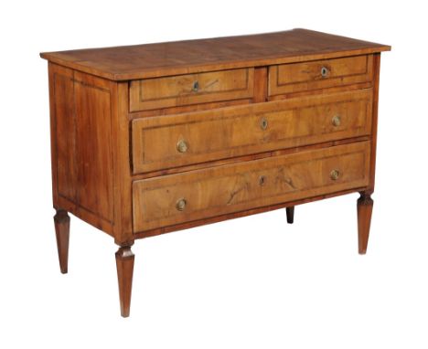  An Italian walnut and crossbanded commode,   circa 1780, the rectangular top above two short drawers and two long drawers, o