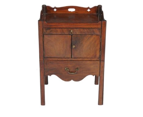  A George III mahogany night commode,   circa 1770, the tray top with integral handles above a pair of doors and pull out sli