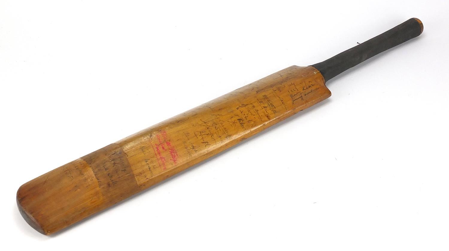 1920's wooden cricket bat with Leicestershire and Warwickshire ink