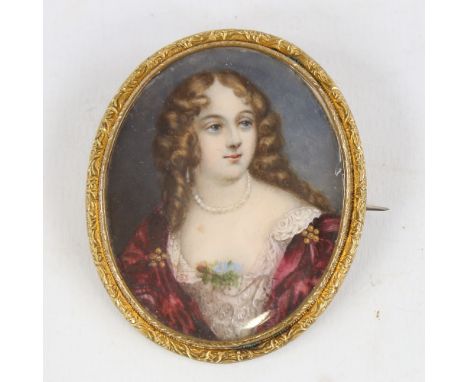 Early 19th century miniature painting on ivory, portrait of a woman wearing a floral trimmed dress, unsigned, in unmarked gil