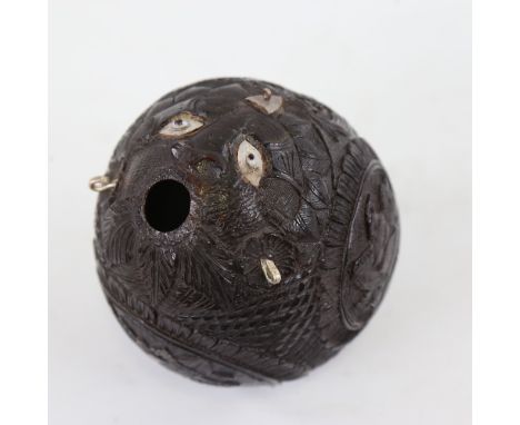 19th century Napoleonic coconut flask, relief carved allover with military insignia, length 10.5cmSeveral small holes at the 