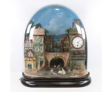 A Vintage castle and harbour design clock automaton under glass dome, late 19th/early 20th century, with rolling steamship in