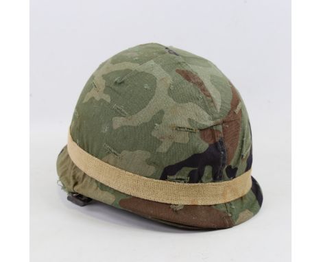 US Army Military helmet, liner dated Oct 1972, with camo cover 