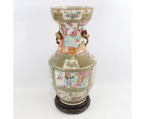 A Chinese Canton enamel porcelain vase, hand painted decoration with relief gilded floral handles, height 43cm, with a hardwo
