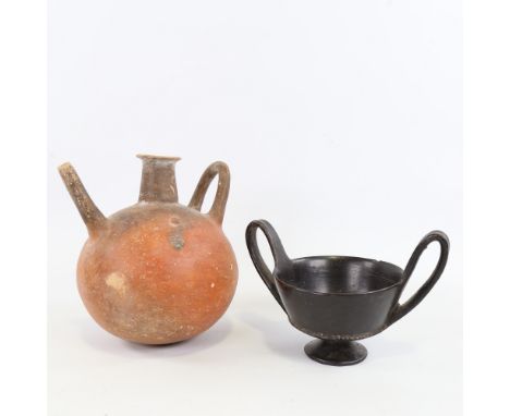 An Ancient terracotta globular redware flagon, height 18cm, and an Ancient Greek blackware 2-handled cup, bowl diameter 11cm 