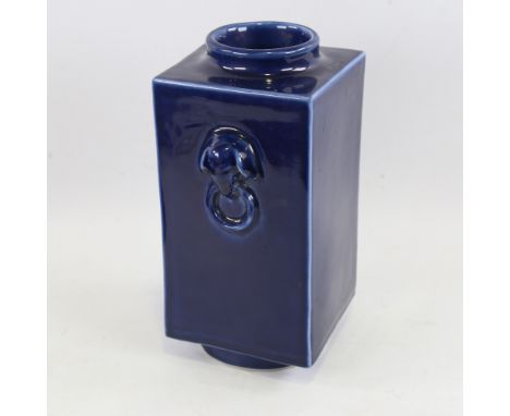 A 19th century Chinese blue glaze porcelain square-section cong vase, relief moulded elephant ring handles, Tongzhi 6 charact