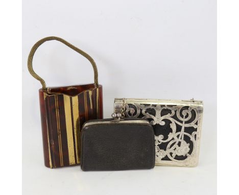 An Art Deco brass and enamel combination compact/purse, a German leather and silver plate evening purse, and 1 other leather 