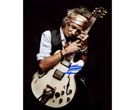 RICHARDS KEITH: (1943- ) English Guitarist and Singer. Best known as founding member of the rock band The Rolling Stones. An 