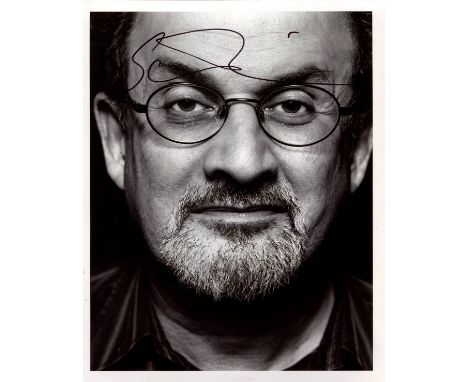 RUSHDIE SALMAN: (1947- ) British Indian Novelist &amp; Essayist. A fine signed 8 x 10 photograph by Rushdie, the image showin