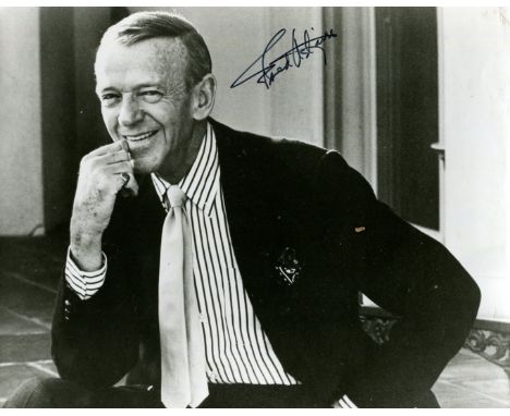 ASTAIRE FRED: (1899-1987) American dancer &amp; actor, Academy Award winner. Signed 9 x 7 photograph of Astaire seated in a h