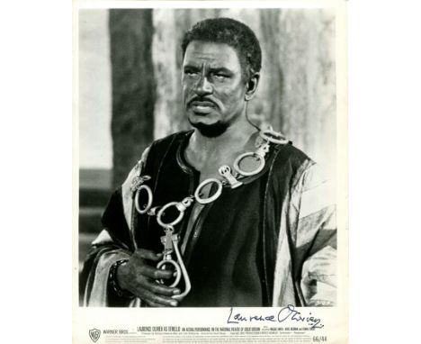 OLIVIER LAURENCE: (1907-1989) English actor, Academy Award winner. Signed 8 x 10 photograph of Olivier standing in a half-len