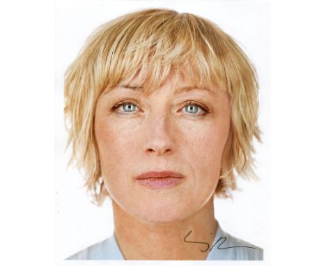 SHERMAN CINDY: (1954- ) American Artist. Best known for her photographic self-portraits. Colour signed 8 x 10 photograph by S