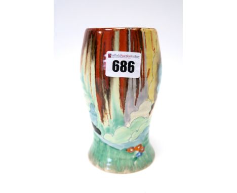 A Wilkinson's Ltd Clarice Cliff Vase, of ribbed ovoid form with spreading foot, painted in the  'Forest Glen' pattern with a 