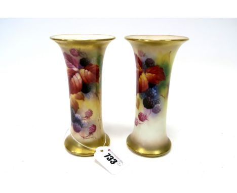 A Pair of Royal Worcester Porcelain Vases, of cylindrical form, with flared necks, painted by Kitty Blake, signed, with flowe